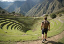 Backpacker exploring circular Inca ruins in Moray, Peru