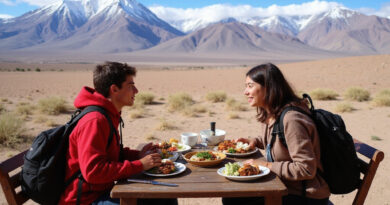 Backpackers dining at מסעדות בסן פדרו דה אטקמה צ'ילה with Andean peaks view