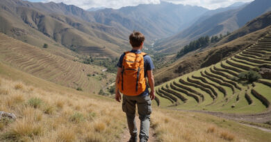 Young backpacker trekking through Moray, Peru's scenic landscapes