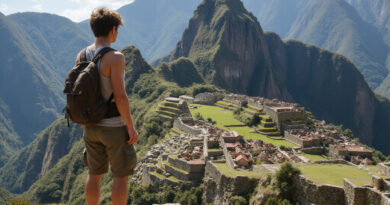 Young backpacker admiring Inca ruins in Ollantaytambo, Peru