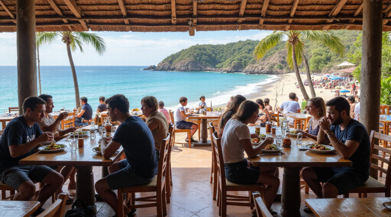 Backpackers enjoying meal at Latin American restaurant in Mancora, Peru