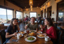 Young backpackers enjoying traditional cuisine in a Puno, Peru restaurant